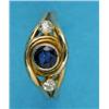 Image 1 : A modern gold ring, collet-set with a sapphire and 2 diamonds...