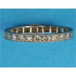 A platinum diamond set full eternity ring...