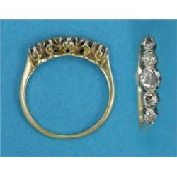 A gold claw-set 5-stone diamond half hoop ring...