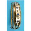 Image 1 : A Victorian gold openwork hinged bangle, the front gypsy-set with 4 sapphires and 3 diamonds...