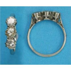 An 18ct white gold and platinum claw-set 3-stone diamond ring...