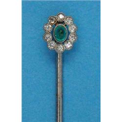A white gold stickpin, with millegrain set cabochon emerald and diamond cluster...