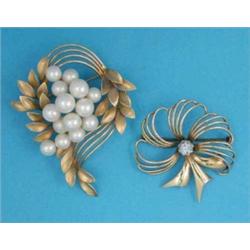 Two modern gold stylised floral spray brooches...