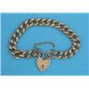 Image 1 : A 9ct gold curblink bracelet, with engraved padlock clasp, 21grms...