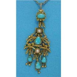An Eastern gold filigree work pendant, set turquoises and split pearls, supporting 3 matching dro...