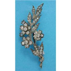 A Victorian gold and silver diamond set floral spray brooch...