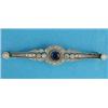 Image 1 : An Edwardian gold and platinum bar brooch, set with a central sapphire in a diamond set pierced w...