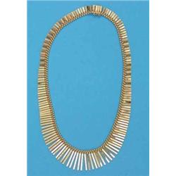 A modern 18ct gold fringe necklace, 56.4grms...