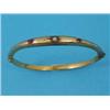 Image 1 : A 15ct gold hinged bangle, the front gypsy set with a diamond and 2 rubies...