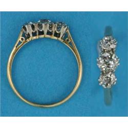 An 18ct gold claw-set 3-stone diamond ring...