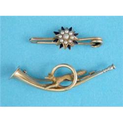 A 2-colour gold hunting horn and fox brooch, together with a gold blue enamel and split pearl sta...