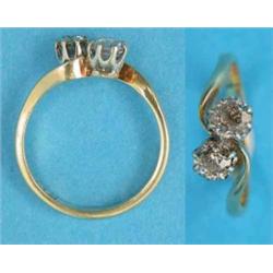 An 18ct gold 2-stone diamond crossover ring...