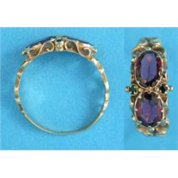 A Victorian gold ring, set 2 oval amethysts...