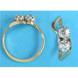 A gold 2-stone diamond crossover ring...