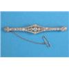 Image 1 : An Edwardian all diamond bar brooch, millegrain set with a centre row of 5 diamonds, bordered by...