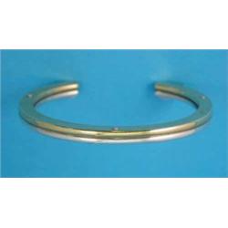 A Georg Jensen silver and gold bangle, No.A78A...