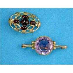 A small 9ct gold openwork brooch, set 5 cabochon garnets, and a gold bar brooch set with a round-...