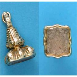 A Victorian gold fob seal intaglio, the matrix carved with an armorial...