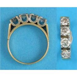 An 18ct gold half eternity ring, claw-set with 4 brilliant cut diamonds...