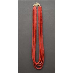 SIX STRANDS OF CORAL GLASS TRADE BEADS