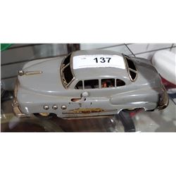 VINTAGE MOTORIZED TIN CAR