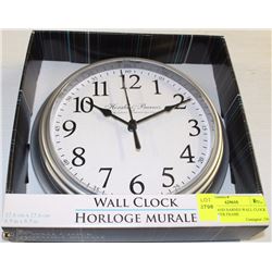 HERALD AND BARNES WALL CLOCK NEW  SILVER FRAME