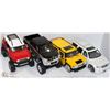Image 1 : LOT OF FOUR 1:24 SCALE DIE CAST TRUCKS