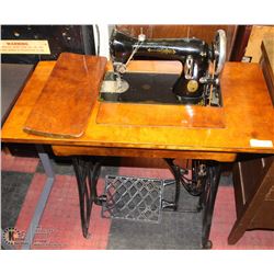 VINTAGE BLACK AND GOLD TREDDLE SEWING MACHINE