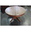Image 1 : ROUND WOOD DINING TABLE ON WHEELS