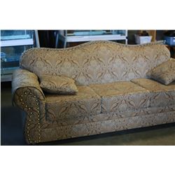 DECORATIVE ROLLED ARM DESIGNER SOFA AND LOVESEAT WITH BRASS NAIL HEAD AND FOUR THROW PILLOWS