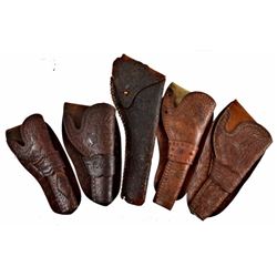 Collection of 5 Tooled Cowboy Design Holsters