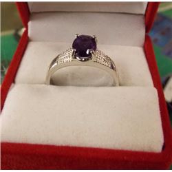 RING - OVAL FACETED 1.5CT AMETHYST & 2 DIAMOND RING IN STERLING SILVER SETTING - RETAIL ESTIMATE $35