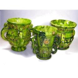 'No.164', a green tyg, 'No.202', a four handled vessel and 'No.162', another tyg, the former with y.