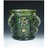 Image 1 : A four handled green vessel, the double lug handles topped with lighter green rope, applied yellowe.