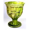 Image 1 : A green glazed goblet with raised and yellow tinted inscription on the rounded body below the flare.