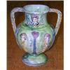 Image 1 : 'No.104', a green two handled baluster vase applied with masks and yellow pendant tendrils between..