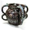 Image 1 : 'For ye Quene and ye Relme 1594', a brown four handled vessel, the double lug handles applied with..