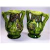 Image 1 : 'No.172', a pair of two handled green vases, the necks of the baluster shapes modelled in relief wi.