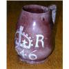 Image 1 : 'CR 1646', a mauve brown mug, the body expanding from the rim in two horizontal lobes, the blue sli.