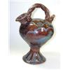Image 1 : 'Antique French Style', a mauve brown Sarum kettle decorated with blue bird crests on each side amo.
