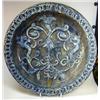 Image 1 : A blue strapwork dish, the rim applied with blue glazed white clay chain enclosing a cornucopia abo.