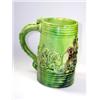 Image 1 : A green frog mug, the tapering cylindrical sides reeded at the top and foot and applied with triton.