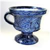 Image 1 : A scratch decorated blue mug, the flared bowl with foliage on the exterior and left white on the in.