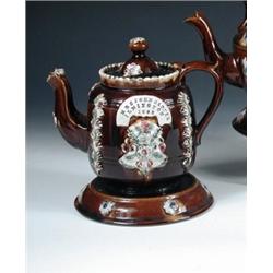'Mrs John Carter, Ilmington, 1892', her bargeware teapot, cover and stand, typically decorated with.