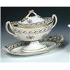Image 1 : A late 18th century Derby sauce tureen, cover and stand, the two handled navette shape painted with.