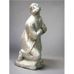 A late 18th/early 19th century pearlware figure, possibly part of a nativity group, the bearded man.