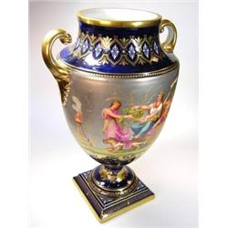 A late 19th century Vienna porcelain vase painted by Jager on the silvered ground ovoid body with a.