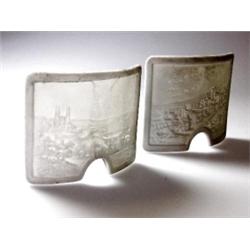 A set of twelve late 19th century German lithophanes, each of the bowed rectangular white porcelain.