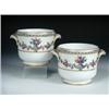 Image 1 : A pair of 18th century Sèvres cachepots, each painted with swags of flowers running from the handle.