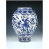 Image 1 : A Saffavid style blue and white vase, the ovoid shape painted in two tones of blue and outlined in..